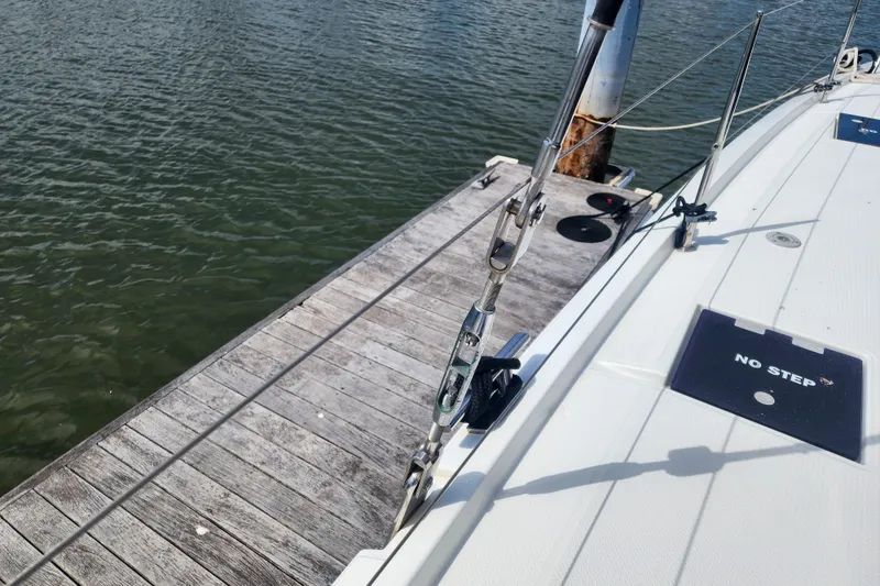 Slide: The Image of Inflatable dinghy with Yamaha motor, docked beside a 2016 Fountaine Pajot Lucia 40. - 29