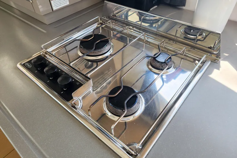 Slide: The Image of Interior of 2016 Fountaine Pajot Lucia 40 catamaran with modern kitchen and seating area. - 48