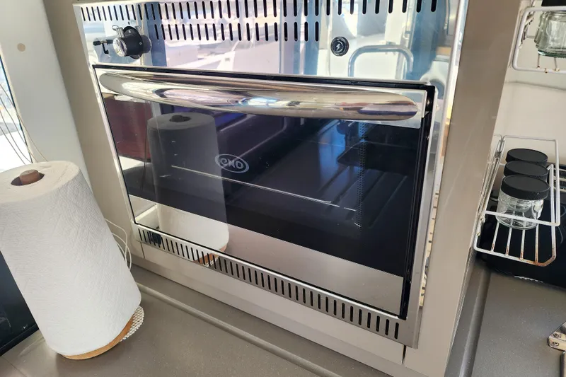 Slide: The Image of Modern kitchen interior of 2016 Fountaine Pajot Lucia 40 catamaran with marina view. - 49