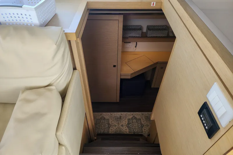 Slide: The Image of Modern kitchen oven on 2016 Fountaine Pajot Lucia 40 yacht with paper towel and spice jars. - 53