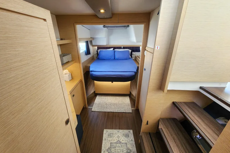 Slide: The Image of Luxurious interior of 2016 Fountaine Pajot Lucia 40 catamaran with comfortable seating and nautical decor. - 54