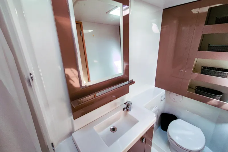 Slide: The Image of Interior of 2016 Fountaine Pajot Lucia 40 yacht, featuring wooden stairs and modern design. - 67