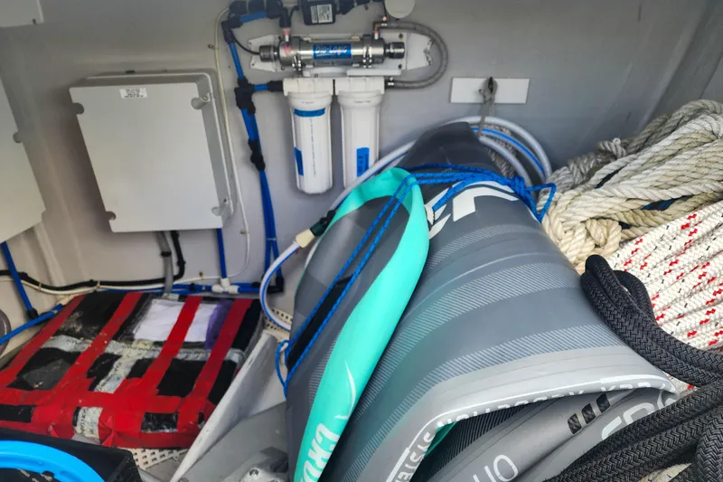 Slide: The Image of 2016 Fountaine Pajot Lucia 40 yacht bathroom with toilet and storage shelf. - 73