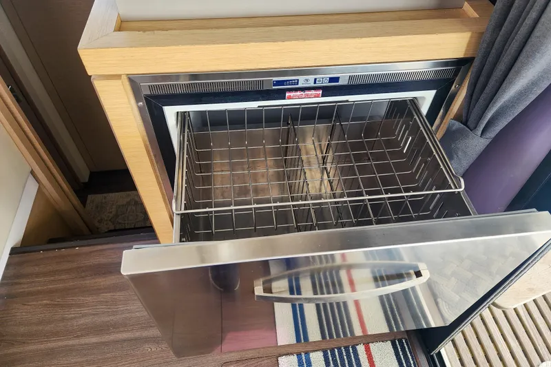 Slide: The Image of Engine compartment of a 2016 Fountaine Pajot Lucia 40 catamaran with Volvo Penta engine. - 85