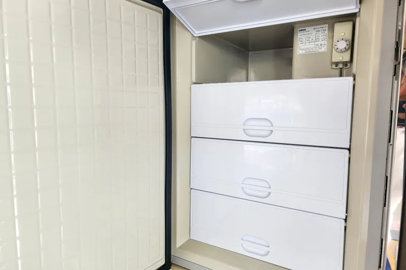 Slide: The Image of Electrical panel on a 2016 Fountaine Pajot Lucia 40 catamaran, showing voltage indicators and wiring. - 87