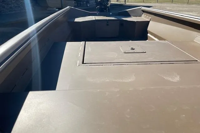 Slide: The Image of 2026 Reaper Boats 550-1880 interior view, showcasing spacious deck and storage compartments. - 4