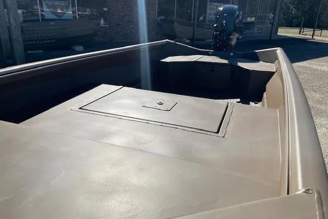 Slide: The Image of 2026 Reaper Boats 550-1880 model, interior view, showcasing spacious deck and storage compartment. - 8