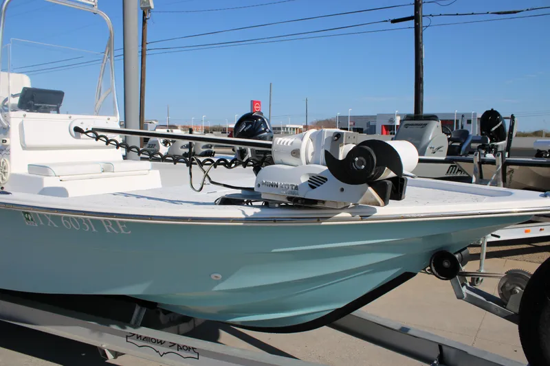 Slide: The Image of 2008 Shallow Sport 24 Modified V boat with Minn Kota trolling motor on trailer. - 16