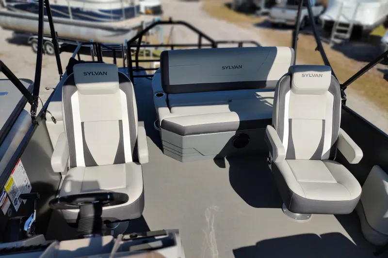 Slide: The Image of 2026 Sylvan Mirage X3 CLZ DH boat interior with stylish seating and modern design. - 4