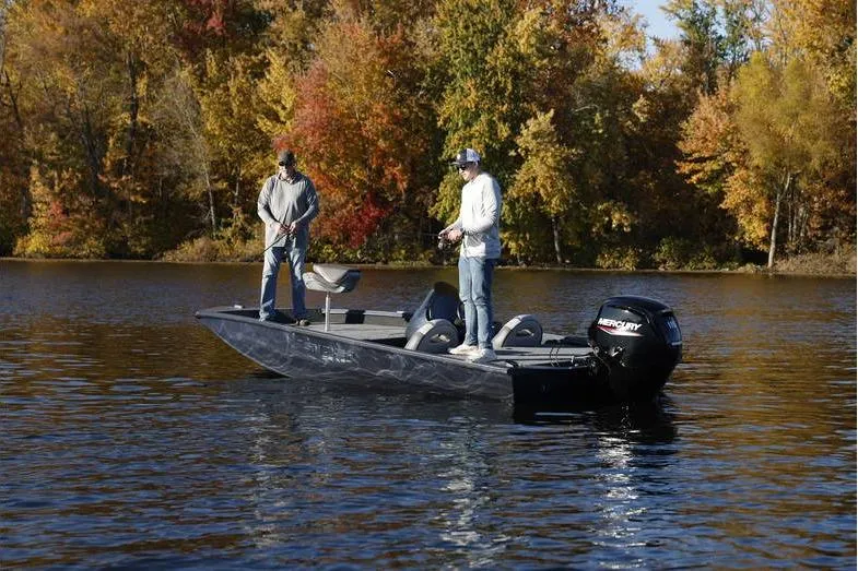 The Image of 2026 Smoker Craft Viper 165 boat on a lake during autumn, with two people fishing. - 1