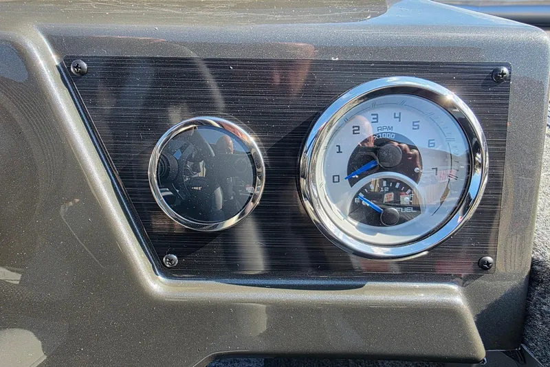 Slide: The Image of Dashboard of 2026 Smoker Craft Viper 165 with RPM and fuel gauges. - 13