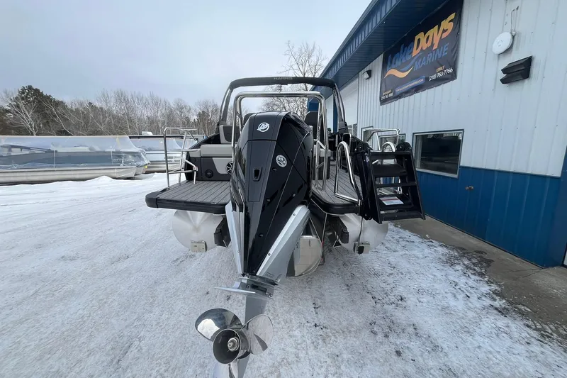 Slide: The Image of 2026 Harris Sunliner 230 pontoon boat at Lake Days Marine dealership. - 3