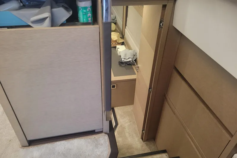 Slide: The Image of Luxurious 2018 Prestige 520 yacht interior with modern design and spacious deck area. - 12