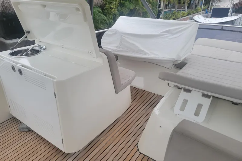 Slide: The Image of Luxurious interior of 2018 Prestige 520 yacht with elegant seating and waterfront view. - 21