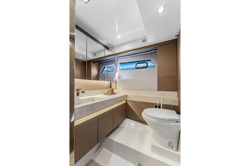 Slide: The Image of Luxurious bathroom interior of 2018 Prestige 520 yacht, featuring modern fixtures and elegant design. - 41