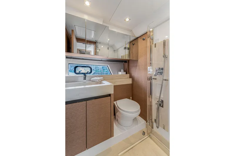 Slide: The Image of Luxurious bathroom in 2018 Prestige 520 yacht with modern fixtures and elegant design. - 42