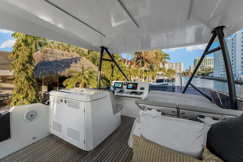Slide: The Image of Luxurious 2018 Prestige 520 yacht interior with modern helm, tropical waterfront view. - 51