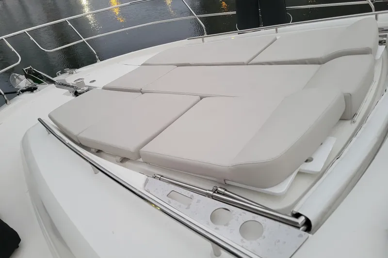 Slide: The Image of Aerial view of 2018 Prestige 520 yacht cruising on open water. - 6