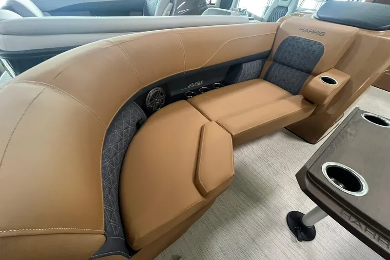 Slide: The Image of Luxurious seating on 2025 Harris Solstice 230 boat with cup holders and premium upholstery. - 7
