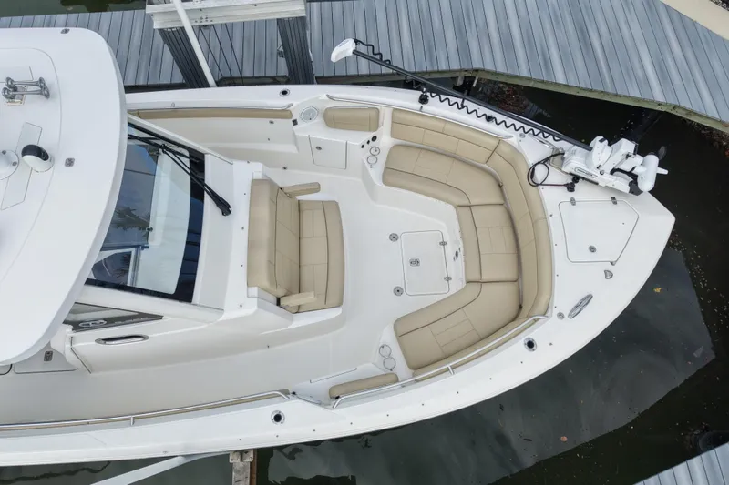 Slide: The Image of 2020 Pursuit S 328 Sport boat with spacious seating and sleek design. - 6