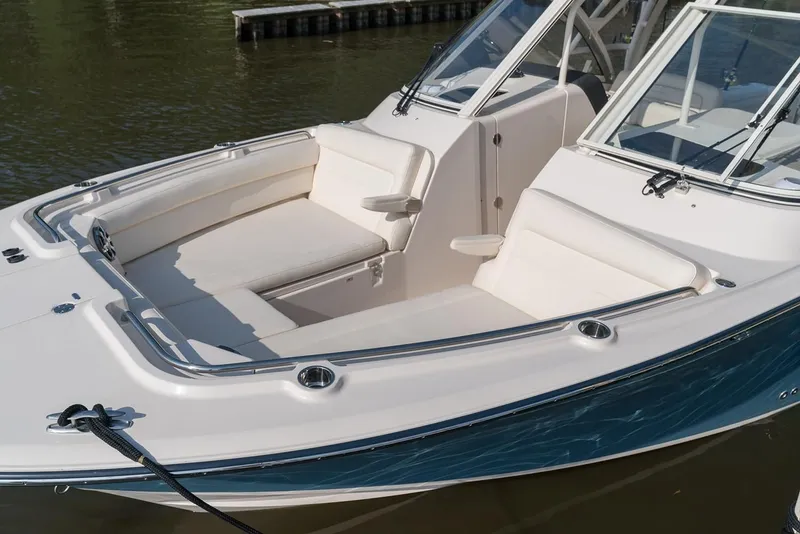 Slide: The Image of 2018 Grady-White Freedom 325 boat with comfortable seating arrangement. - 4
