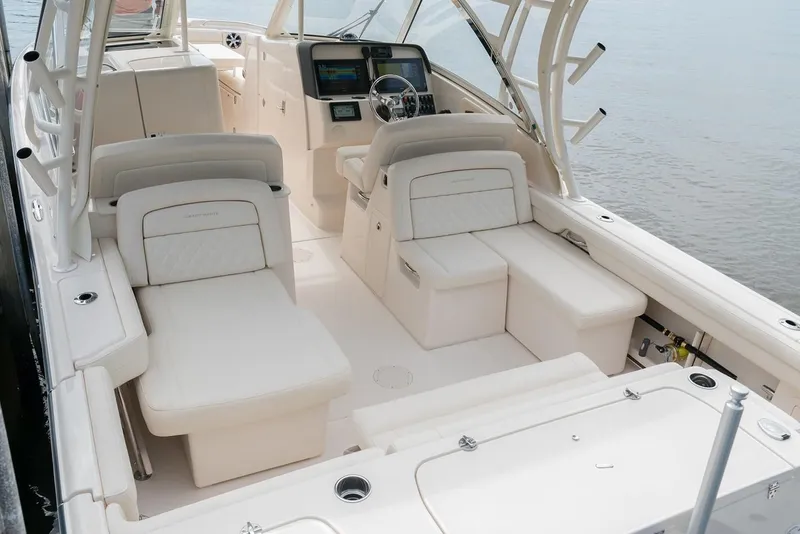 Slide: The Image of 2018 Grady-White Freedom 325 boat interior with seating. - 7