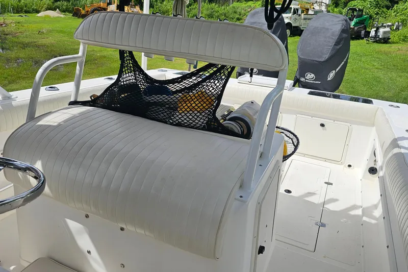 Slide: The Image of 1993 Marlin 350 Sportfish boat interior with seating and storage compartments. - 14