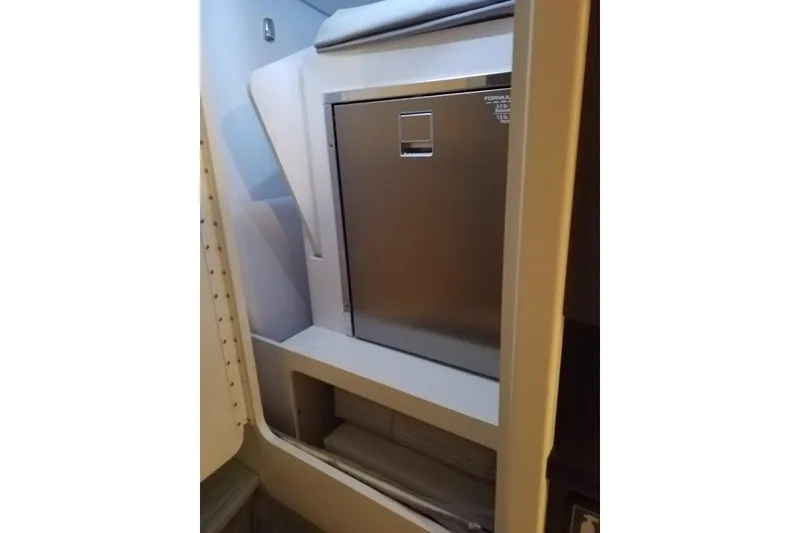 Slide: The Image of 2019 Formula 382 FASTech cabin interior with sleek storage compartment. - 17