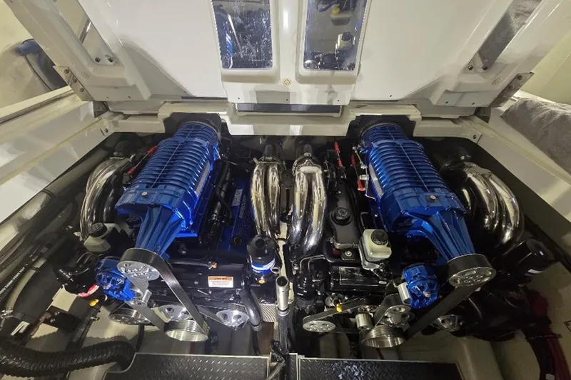 Slide: The Image of 2019 Formula 382 FASTech engine compartment with dual blue supercharged engines. - 19