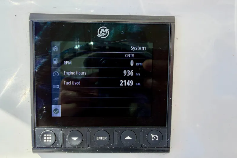 Slide: The Image of Display screen of 2023 Aquasport 2200 Center Console showing engine hours and fuel usage. - 21