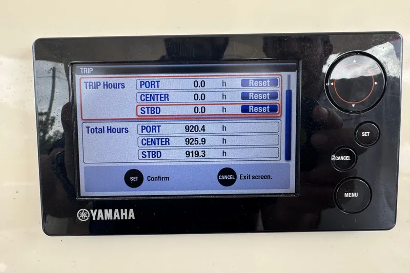 Slide: The Image of Yamaha display showing engine hours for 2015 Cobia 344 Center Console boat. - 23