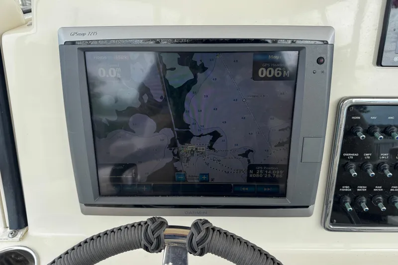 Slide: The Image of Garmin GPSmap 7215 on 2015 Cobia 344 Center Console boat dashboard. - 26