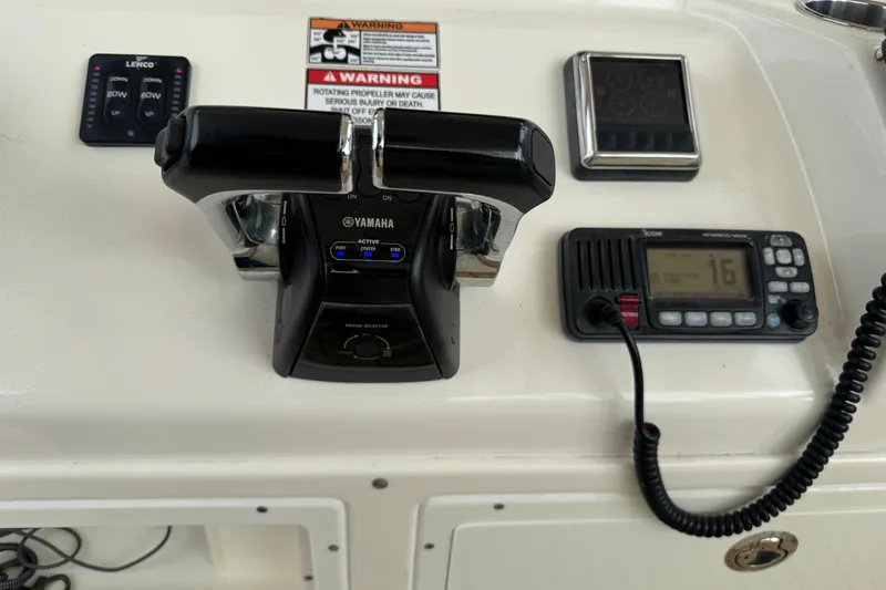 Slide: The Image of Yamaha controls on 2015 Cobia 344 Center Console. - 33