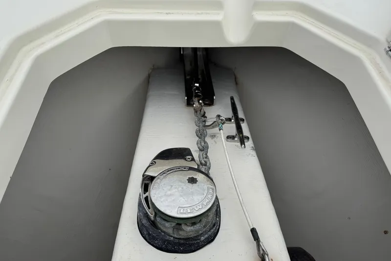 Slide: The Image of 2015 Cobia 344 Center Console anchor chain and winch detail. - 37