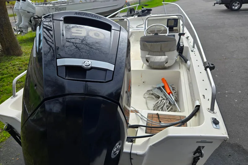 Slide: The Image of 1989 Wahoo 16.2 boat with Mercury 90 outboard motor, interior view. - 4