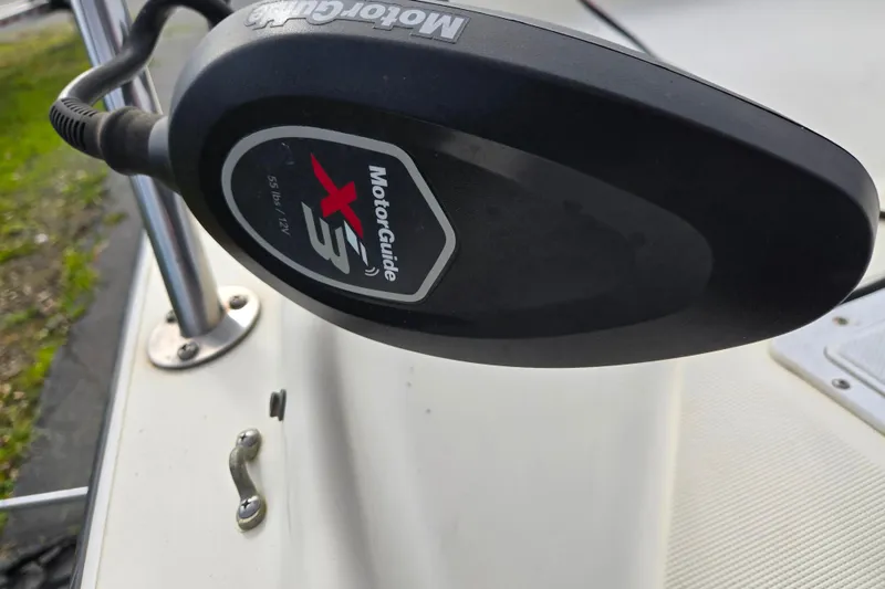 Slide: The Image of MotorGuide X3 motor on 1989 Wahoo 16.2 boat, close-up view. - 5