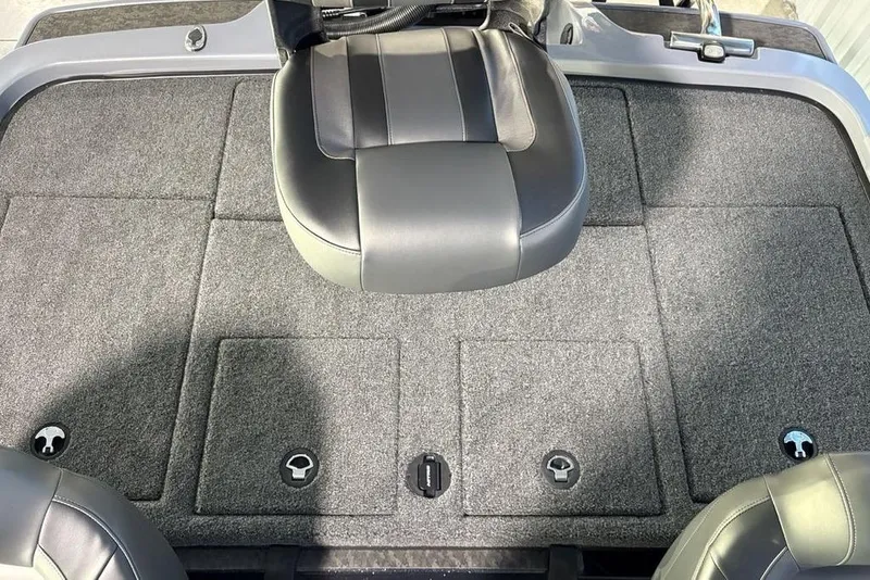 Slide: The Image of 2026 Nitro Z19 Pro boat interior with gray carpet and seating. - 11