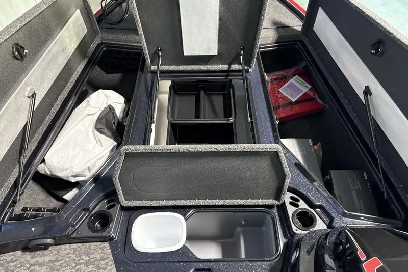 Slide: The Image of 2026 Nitro Z19 Pro boat storage compartments with open lids, showcasing organized interior space. - 2