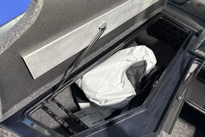 Slide: The Image of Storage compartment of 2026 Nitro Z19 Pro boat with cover and accessories. - 3
