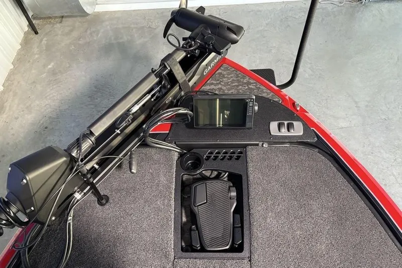 Slide: The Image of 2026 Nitro Z19 Pro boat deck with Garmin electronics and foot pedal controls. - 6