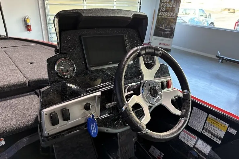 Slide: The Image of Steering console of 2026 Nitro Z19 Pro boat with modern dashboard and controls. - 8