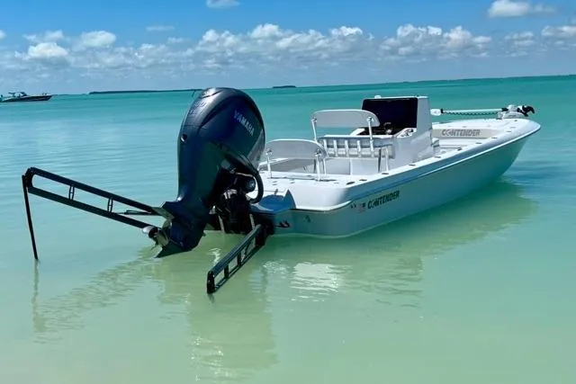 The Image of 2023 Contender 26 Bay boat in clear turquoise water under blue sky. - 0