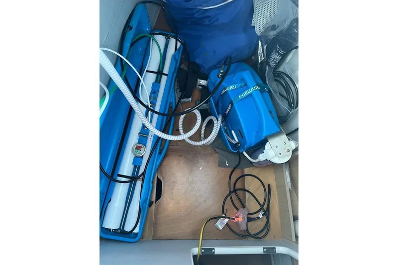 Slide: The Image of Storage compartment of 2014 Lagoon 39 yacht with equipment and cables. - 11