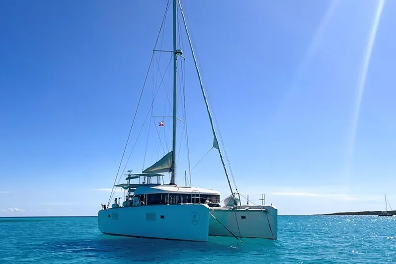 Slide: The Image of 2014 Lagoon 39 catamaran sailing on clear blue waters under a sunny sky. - 2
