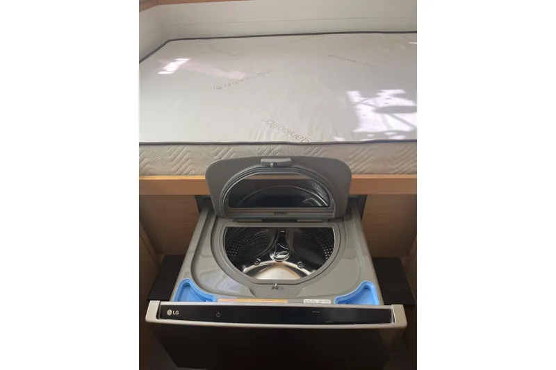 Slide: The Image of LG washing machine under bed in 2014 Lagoon 39 yacht interior. - 22