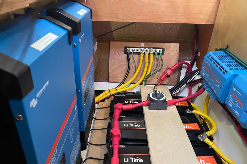 Slide: The Image of Electrical system setup in a 2014 Lagoon 39 catamaran with lithium batteries and inverters. - 33