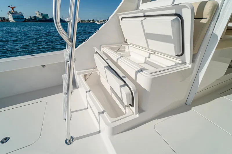 Slide: The Image of Manufacturer Provided Image: 2026 Viking 46 Billfish boat with open storage compartments on deck. - 5