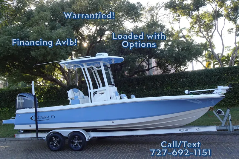 The Image of 2022 Robalo 246 Cayman boat on trailer, warranty and financing available, contact 727-692-1151. - 0