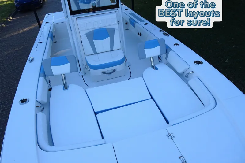 Slide: The Image of 2022 Robalo 246 Cayman boat interior with spacious seating layout. - 10