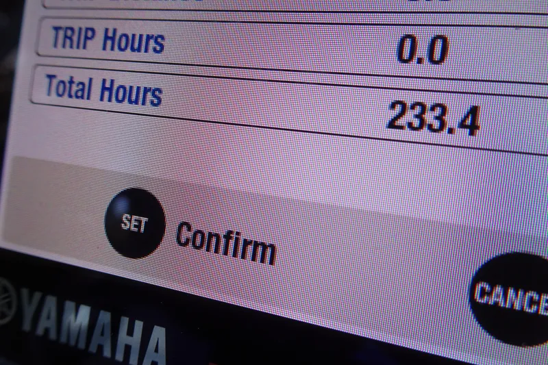 Slide: The Image of Display screen showing 233.4 total hours on 2022 Robalo 246 Cayman boat. - 13